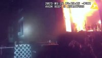 Bodycam footage shows Ohio police rescue residents from a house fire
