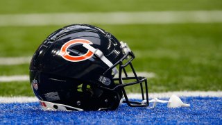 INDIANAPOLIS, IN – AUGUST 19: A Chicago Bears helmet sits on the turf prior to the start of a preseason game between the Chicago Bears and the Indianapolis Colts on August 19, 2023 at Lucas Oil Stadium in Indianapolis, IN. (Photo by Jeffrey Brown/Icon Sportswire via Getty Images)