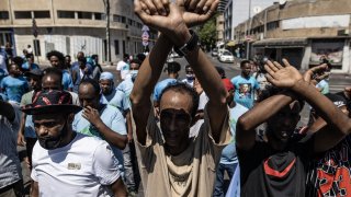 TEL AVIV, ISRAEL – SEPTEMBER 02: Eritrean asylum seekers stage a protest in front of the Eritrean Embassy building in Tel Aviv, Israel on September 02, 2023. Eritrean asylum seekers in Israel marched towards the embassy building to protest an event organized by the Eritrean Embassy in Tel Aviv. Israeli police intervened against the marching demonstrators. (Photo by Mostafa Alkharouf/Anadolu Agency via Getty Images)