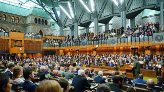 Volodymyr Zelenskiy, Ukraine's president, right, speaks in the House of Commons