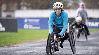 BOSTON, MA – NOVEMBER 13:Jenna Fesemyer crosses the finish line to win the women’s wheelchair division in the 2022 B.A.A. Half Marathon on November 13, 2022 in Boston, Massachusetts. (Photo by Maddie Malhotra/Getty Images)