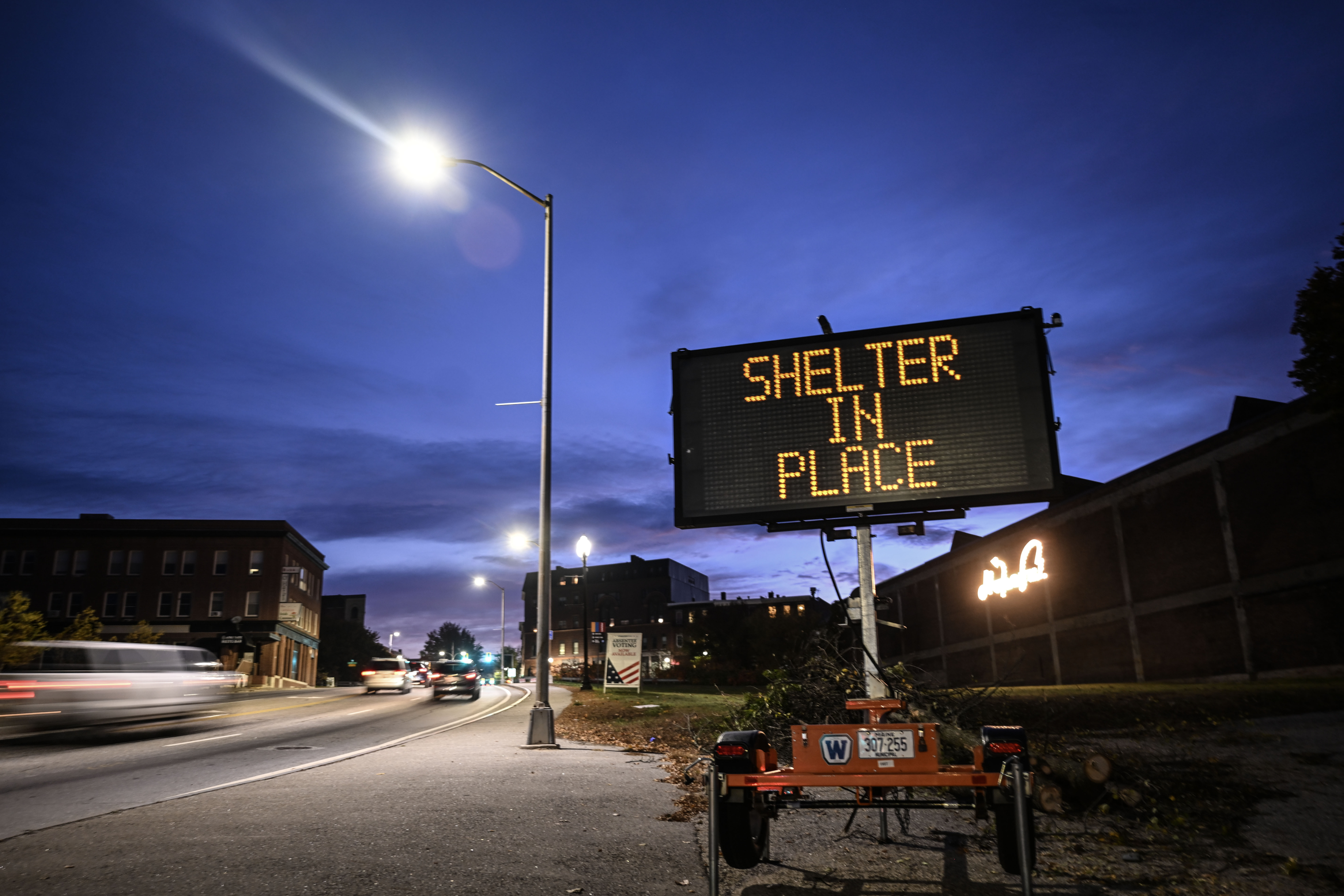 A view of the street while police officers close the road as they patrol around the surrounding area, October 26, 2023.