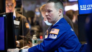 Traders on the floor of the NYSE, April 14, 2022.