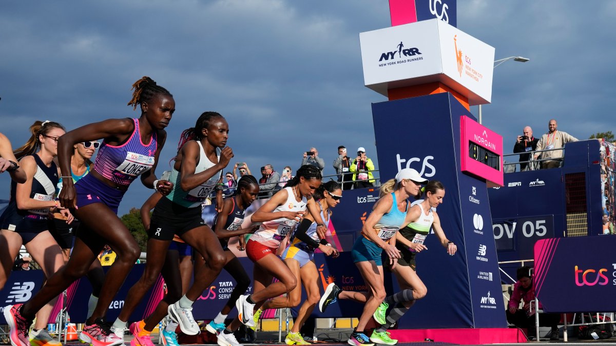 Tola sets NYC Marathon course record to win men's race – NBC Chicago - Vimarsana News