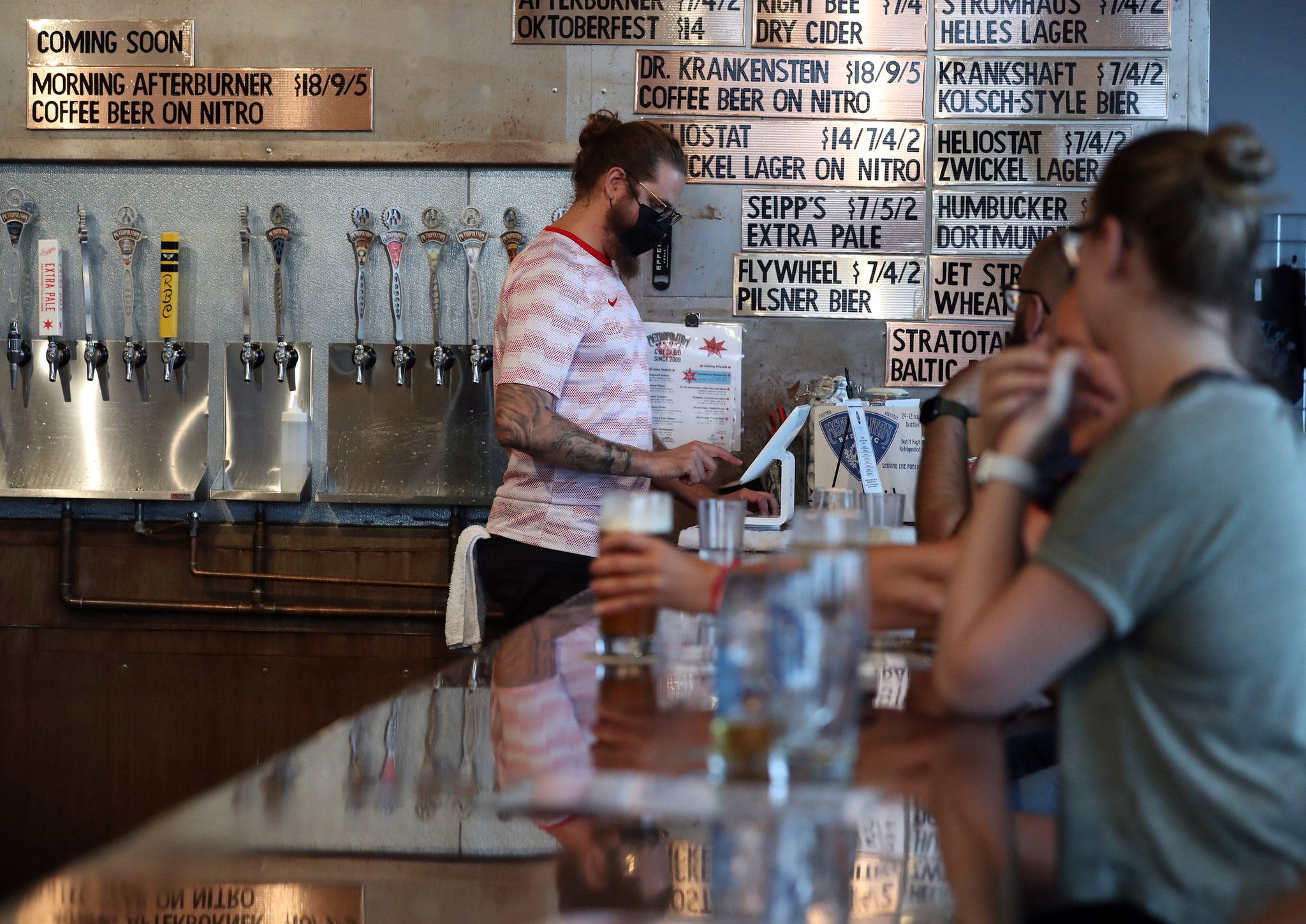 this brewery has a refrigerated strip on the bar to keep your beer