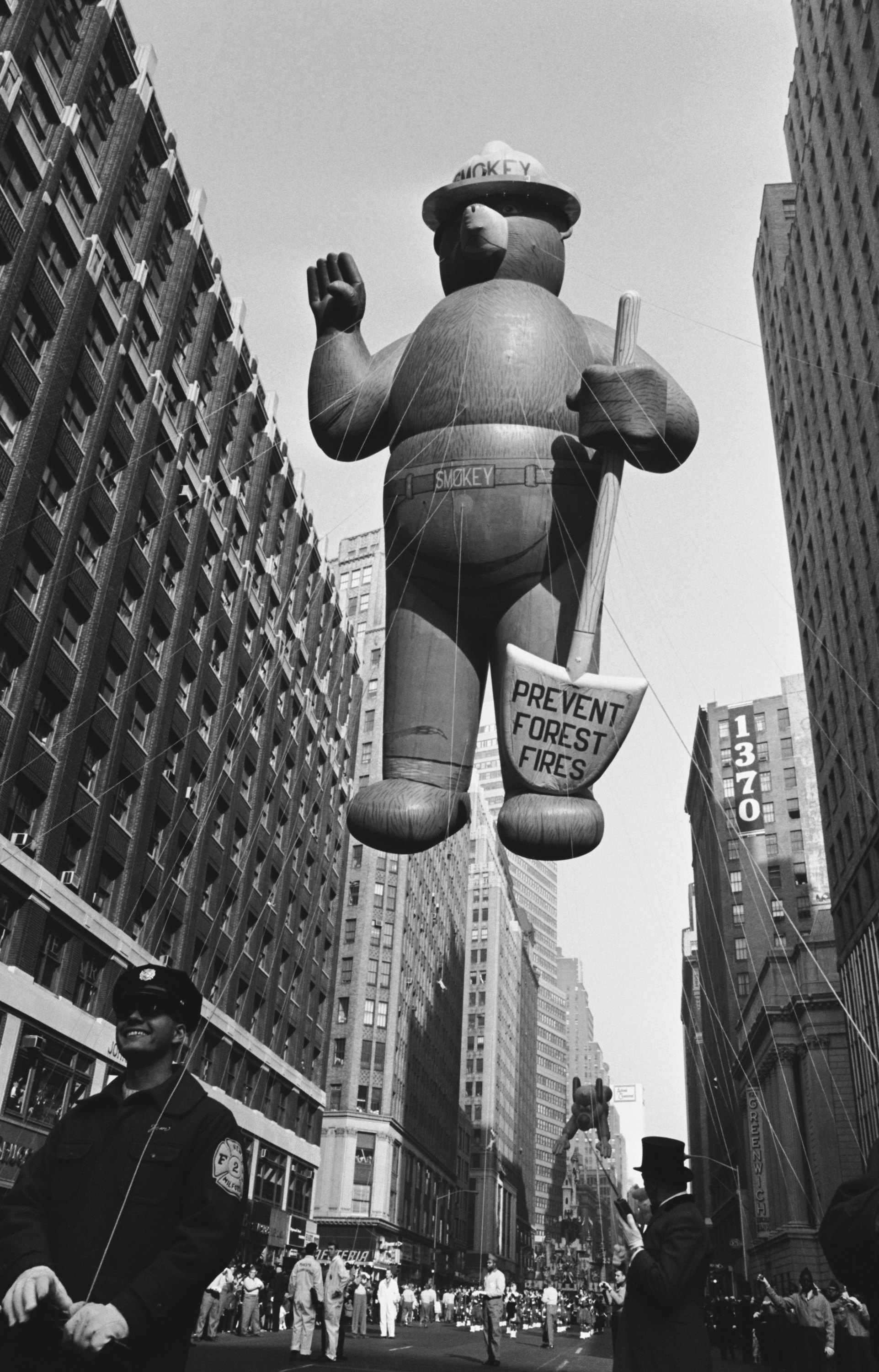 Smokey the Bear balloon passes over head during the 1966 Macy’s Thanksgiving Day Parade — Photo by: NBCU Photo Bank