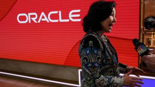 Safra Catz, CEO of Oracle Corporation, rings the opening bell at the New York Stock Exchange, July 12, 2023.