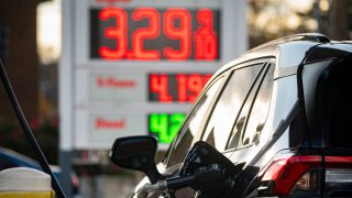 A vehicle refuels at a Shell gas station in Hyattsville, MD, US, on Tuesday, Nov. 28, 2023.