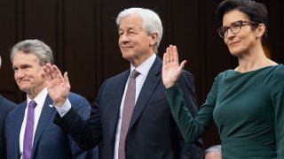 (L-R) Brian Moynihan, Chairman and CEO of Bank of America; Jamie Dimon, Chairman and CEO of JPMorgan Chase; and Jane Fraser, CEO of Citigroup; testify during a Senate Banking Committee hearing at the Hart Senate Office Building on December 06, 2023 in Washington, DC.