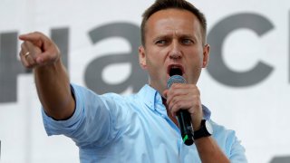 Russian opposition activist Alexei Navalny gestures while speaking to a crowd during a political protest in Moscow, Russia on July 20, 2019.