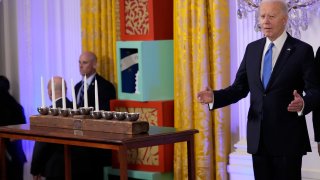 President Joe Biden arrives to speak at a Hanukkah reception in the East Room