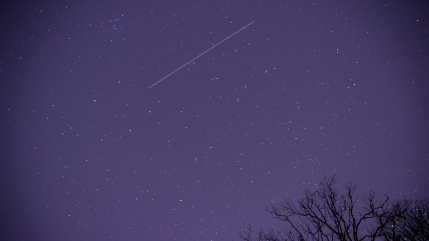 TENNESSEE, USA – DECEMBER 14: A meteor streaks across the night sky in Nashville, Tennessee, United States as the Geminid meteor shower reached its maximum in the early morning of December 14, 2021. (Photo by Tayfun Coskun/Anadolu Agency via Getty Images)