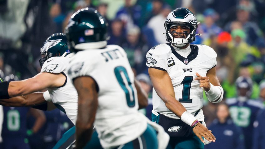 Dec 18, 2023; Seattle, Washington, USA; Philadelphia Eagles quarterback Jalen Hurts (1) passes against the Seattle Seahawks during the first quarter at Lumen Field. Mandatory Credit: Joe Nicholson-USA TODAY Sports