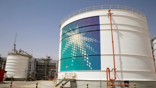 An Aramco oil tank is seen at the Production facility at Saudi Aramco’s Shaybah oilfield in the Empty Quarter, Saudi Arabia.