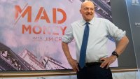 Jim Cramer at the NYSE with Mad Money graphic, June 30, 2022.