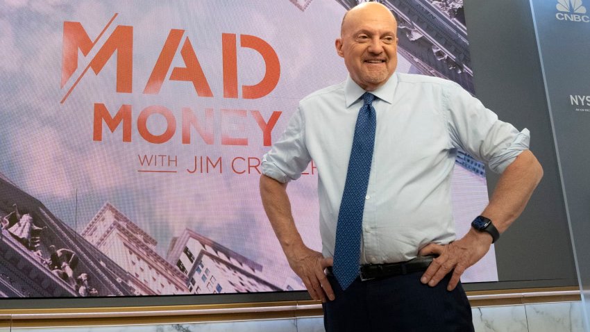Jim Cramer at the NYSE with Mad Money graphic, June 30, 2022.