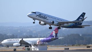 Alaska and Hawaiian Airlines planes takeoff at the same time from San Francisco International Airport (SFO) in San Francisco, California, United States on June 21, 2023.