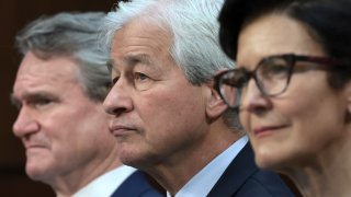 (L-R) Brian Moynihan, Chairman and CEO of Bank of America; Jamie Dimon, Chairman and CEO of JPMorgan Chase; and Jane Fraser, CEO of Citigroup; testify during a Senate Banking Committee hearing at the Hart Senate Office Building on December 06, 2023 in Washington, DC.