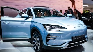 Visitors look at an BYD Seal U electric car of Chinese car brand BYD at the IAA Mobility 2023 international motor show on September 6, 2023 in Munich, Germany.
