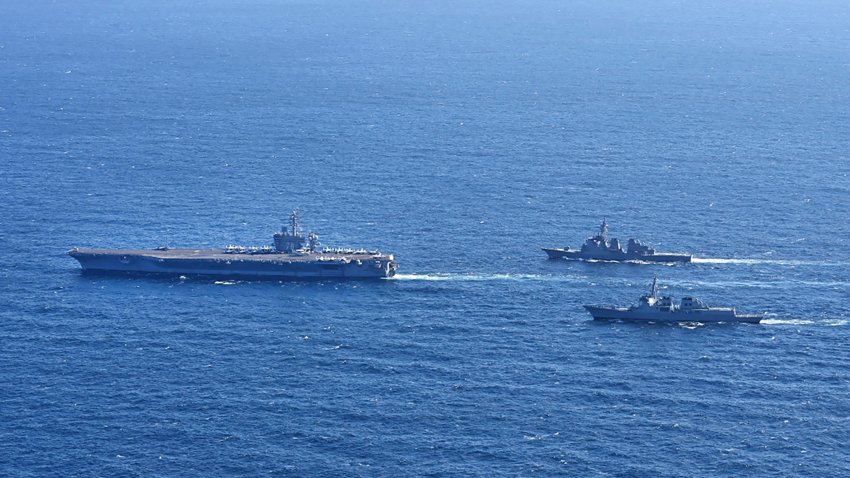 The three countries conducted combined naval exercises involving the American aircraft carrier in their latest show of strength against nuclear-armed North Korea.