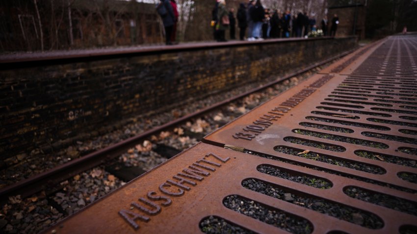The name of the Nazi death camp Auschwitz photographed at ‘Gleis 17’, Track 17, the memorial site for the train transportation from Berlin to the camp, on International Holocaust Remembrance Day in Berlin, Germany, Saturday, Jan. 27, 2024. The International Holocaust Remembrance Day marks the anniversary of the liberation of the Nazi death camp Auschwitz – Birkenau on Jan. 27, 1945.