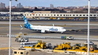 A Boeing 737-900er passengers aircraft of Alaska Airlines on its way to San Francisco is seen before take-off at John F. Kennedy Airport on Jan. 8, 2024.