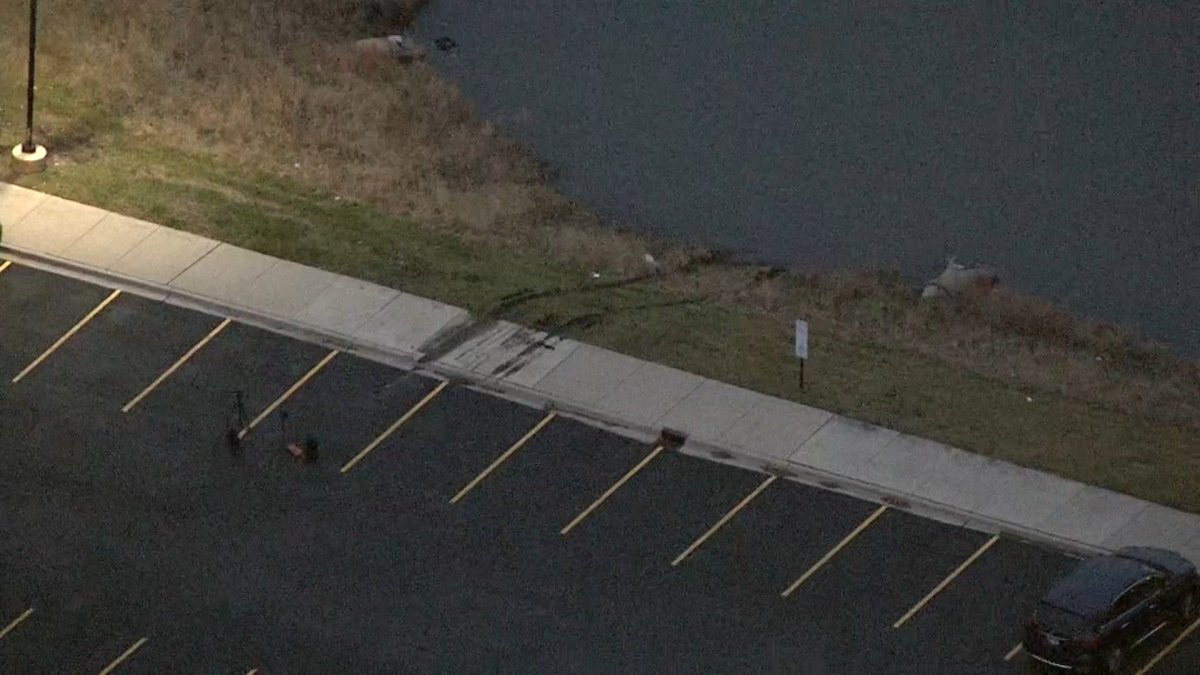 3 people pulled from vehicle after it plunged into Naperville pond