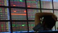 Asia markets open higher on data-heavy day