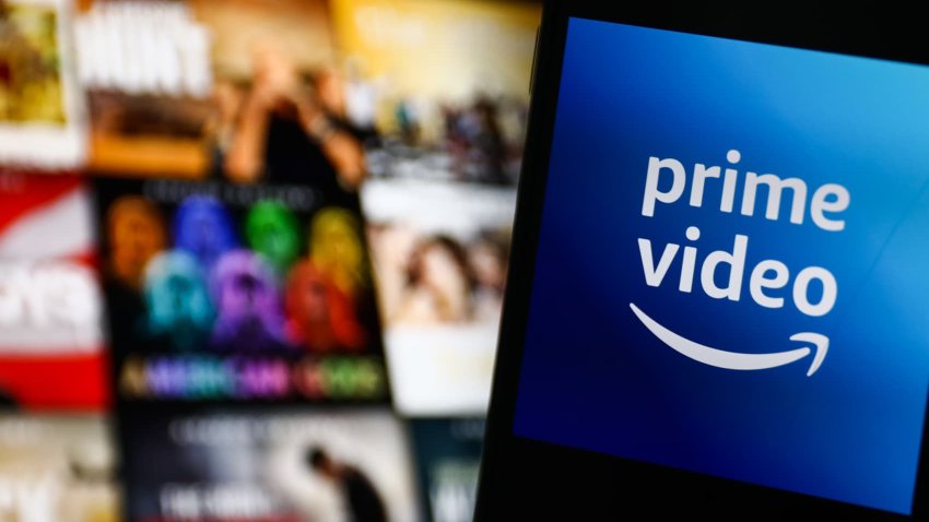 Amazon Prime Video logo displayed on a phone screen and Amazon Prime Video website displayed on a screen in the background are seen in this illustration photo taken in Krakow, Poland on July 26, 2022.