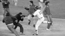 Chris Chambliss's homerun advances the Yankees to the World Series and fans rush the field in celebration.(Photo by Bettmann Archive/Getty Images)