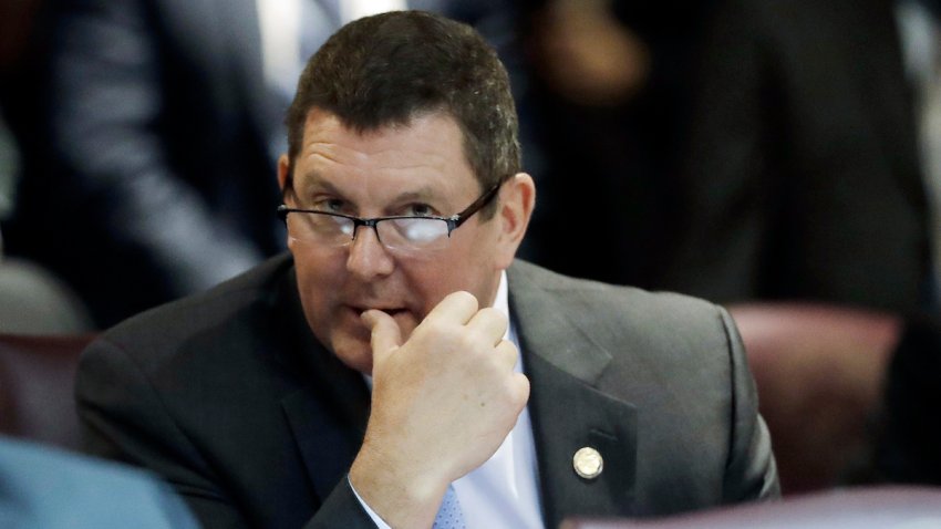 FILE – Indiana Rep. Jim Lucas, R-Seymour, listens during the start of the General Assembly session at the Statehouse, Jan. 3, 2018, in Indianapolis.