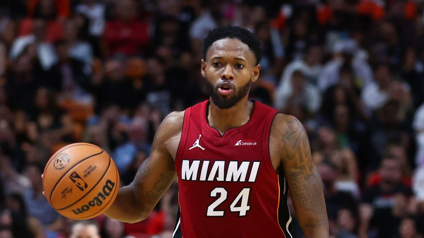 MIAMI, FLORIDA – JANUARY 12: Haywood Highsmith #24 of the Miami Heat dribbles the ball against the Orlando Magic during the third quarter of the game at Kaseya Center on January 12, 2024 in Miami, Florida. NOTE TO USER: User expressly acknowledges and agrees that, by downloading and or using this photograph, User is consenting to the terms and conditions of the Getty Images License Agreement. (Photo by Megan Briggs/Getty Images)