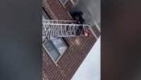 Video shows rescue of baby from burning building in South Shore