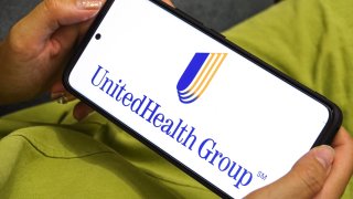 In this photo illustration the UnitedHealth Group logo displayed on a smartphone screen.
