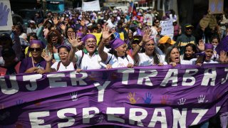 TOPSHOT-VENEZUELA-8MARCH-WOMEN-RIGHTS-PROTEST