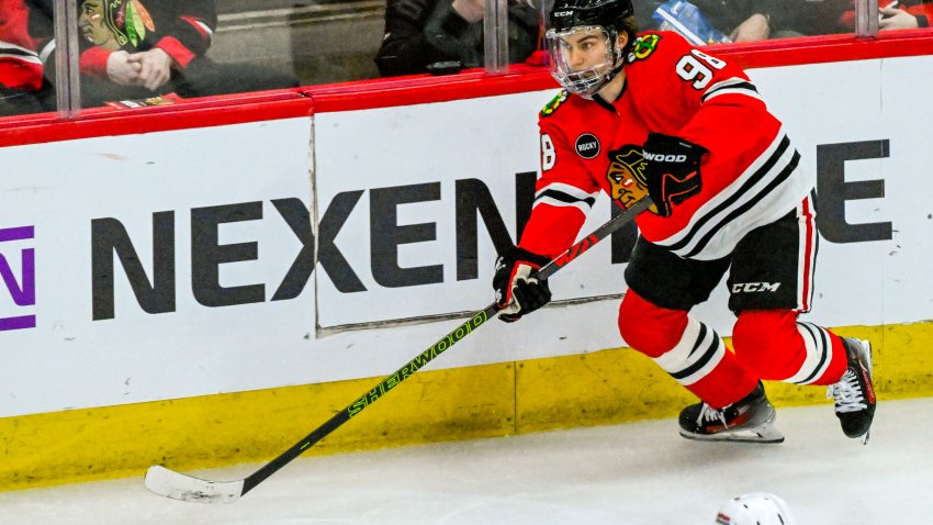 Mar 2, 2024; Chicago, Illinois, USA;  Chicago Blackhawks center Connor Bedard (98) moves the puck against the Columbus Blue Jackets during the second period at the United Center. Mandatory Credit: Matt Marton-USA TODAY Sports