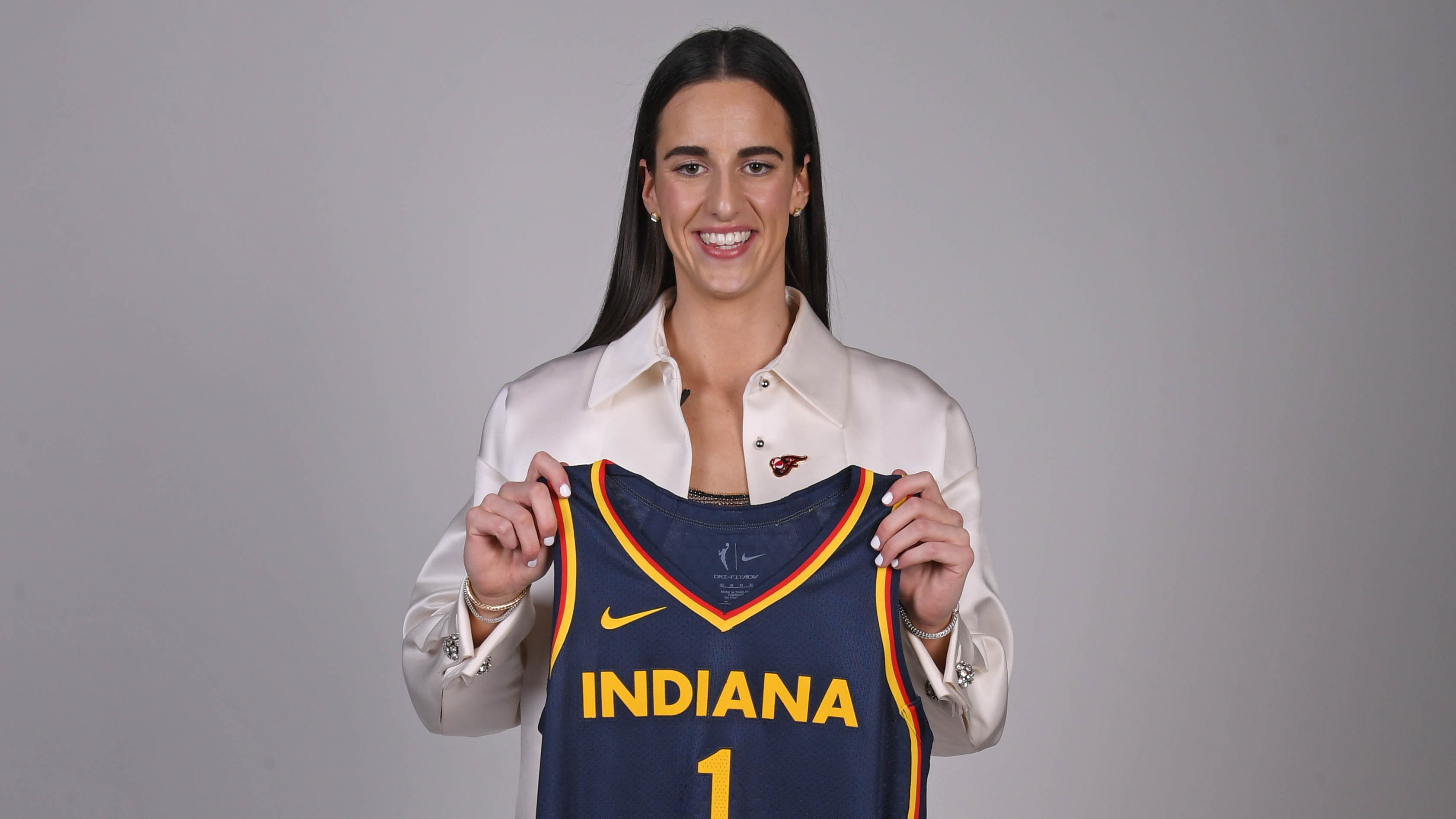 Caitlin Clark went No. 1 in the WNBA draft. Some fans are outraged at
her salary