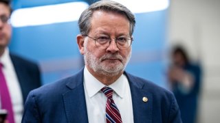 Sen. Gary Peters, D-Mich., arrives in the U.S. Capitol for a vote on Feb. 27. Bill Clark / CQ-Roll Call, Inc via Getty Images file