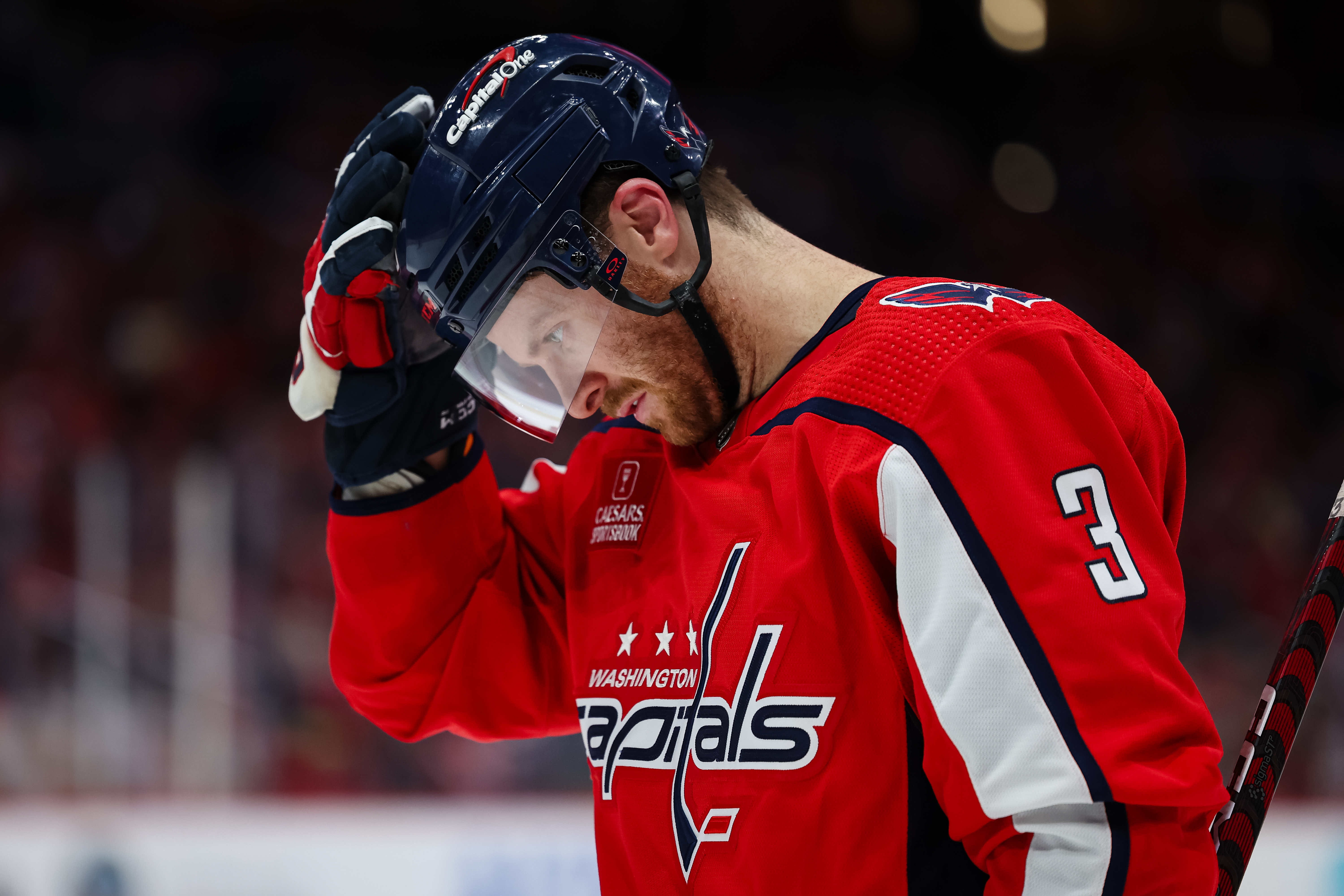 Capitals' Nick Jensen is conscious and alert after being stretchered
off the ice