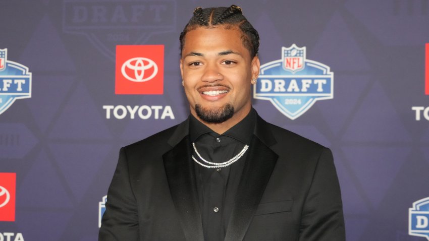 Apr 25, 2024; Detroit, MI, USA; Washington Huskies wide receiver Rome Odunze stands on the red carpet ahead of the 2024 NFL Draft at Detroit’s Fox Theatre. Mandatory Credit: Kirby Lee-USA TODAY Sports