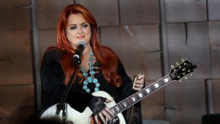 FILE - Wynonna Judd performs at "A Night of HOPE" fundraiser for the HOPE for Prisoners program at Las Vegas Ballpark on Nov. 21, 2019, in Las Vegas.