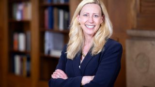 In this image provide by Yale University, Yale’s new president Maurie McInnis poses in New Haven, Conn. McInnis, a longtime higher education leader and cultural historian, was named the 24th president of Yale University on Wednesday, May 29, 2024, becoming the first woman to be installed permanently to the position. (Yale University via AP)