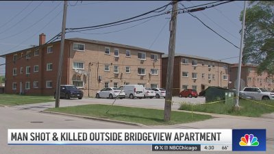 Man shot to death while getting into his car at suburban apartment complex