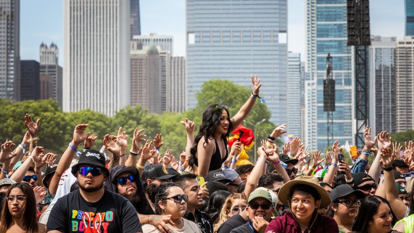 CHICAGO, ILLINOIS – MAY 28: Sueños Festival goers enjoy the sun and music against the Chicago skyline while at Grant Park on May 28, 2023 in Chicago, Illinois. (Photo by Natasha Moustache/Getty Images)