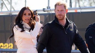FILE - Prince Harry and Meghan Markle visit the track and field event at the Invictus Games in The Hague, Netherlands, April 17, 2022.