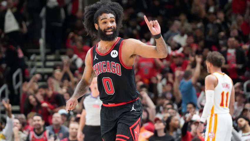 Apr 17, 2024; Chicago, Illinois, USA; Chicago Bulls guard Coby White (0) gestures after making a three point basket against the Atlanta Hawks during the second half during a play-in game of the 2024 NBA playoffs at United Center. Mandatory Credit: David Banks-USA TODAY Sports