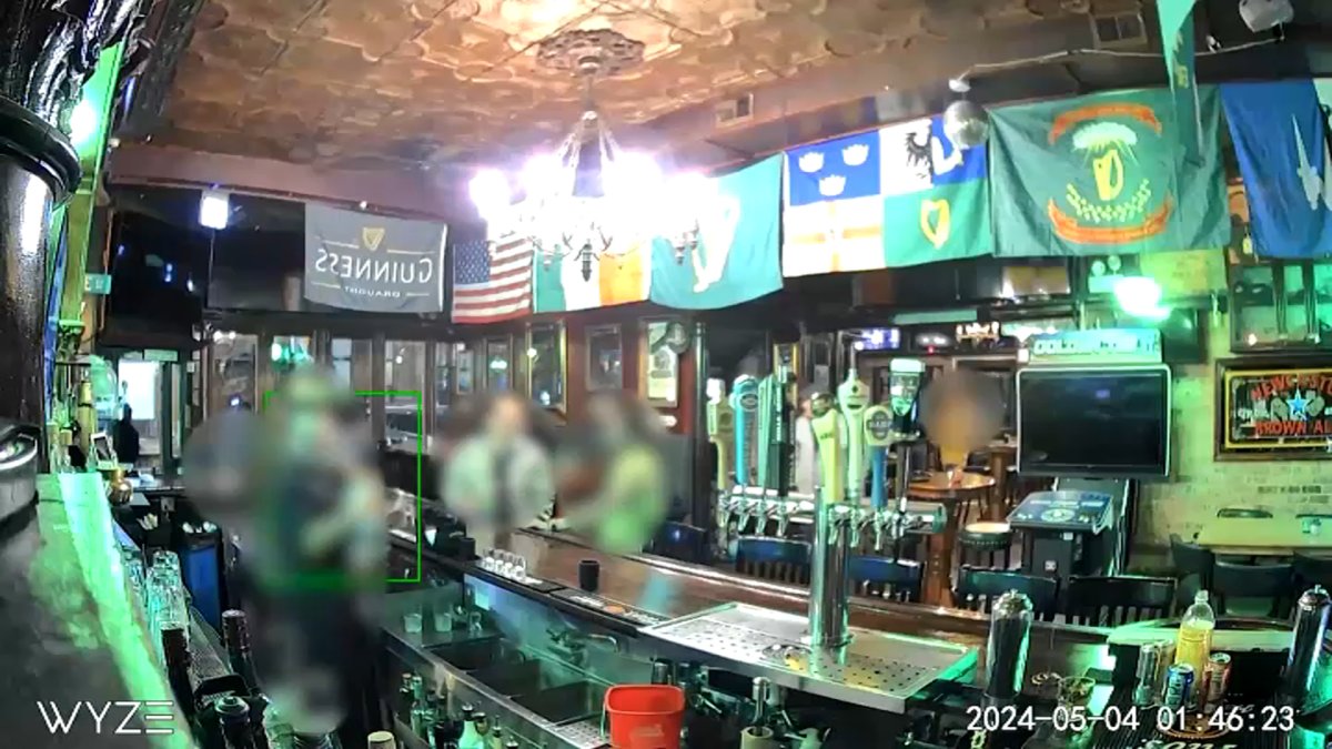Surveillance video shows armed thieves storm West Town bar Surveillance video shows armed thieves storm West Town bar