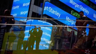 Signage is displayed outside Morgan Stanley & Co. headquarters in the Times Square neighborhood of New York.