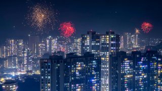 MUMBAI, INDIA – OCTOBER 24: Fireworks in the sky over the skyline on the occasion of Diwali at Kanjurmarg, on October 24, 2022 in Mumbai, India. People decorated their houses with diyas (earthen lamps), candles and electric lamps to celebrate the festival of lights. This festival witnessed grand celebrations after a gap of two years since coronavirus curbs were in place in 2020 and 2021. (Photo by Pratik Chorge/Hindustan Times via Getty Images)