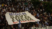 People protest against Israeli Prime Minister Benjamin Netanyahu's government and call for the release of hostages held in the Gaza Strip by the Hamas militant group in Tel Aviv, Israel, Saturday, June 1, 2024. (AP Photo/Maya Alleruzzo)